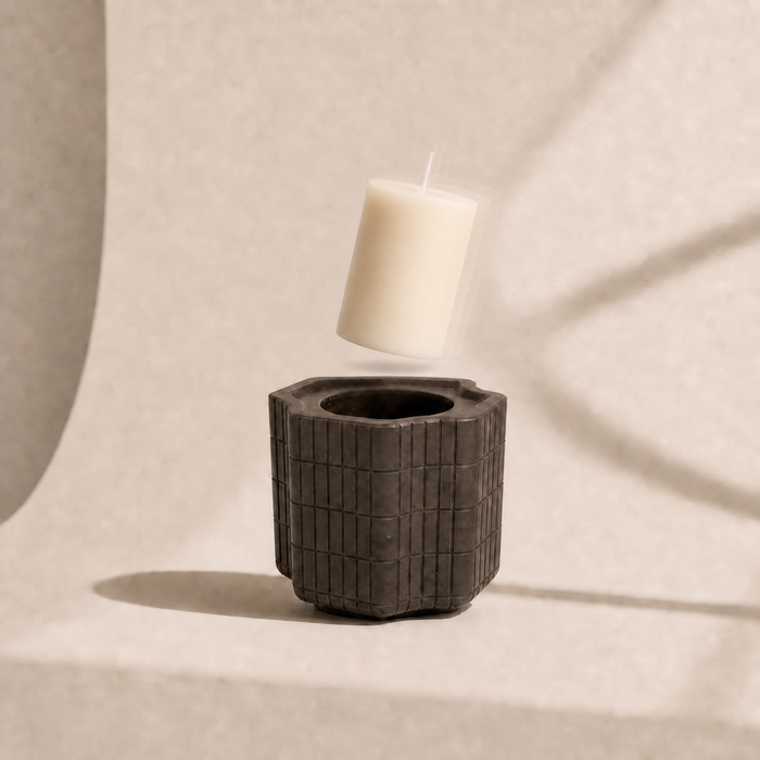 Sculptural vessel with refill candle